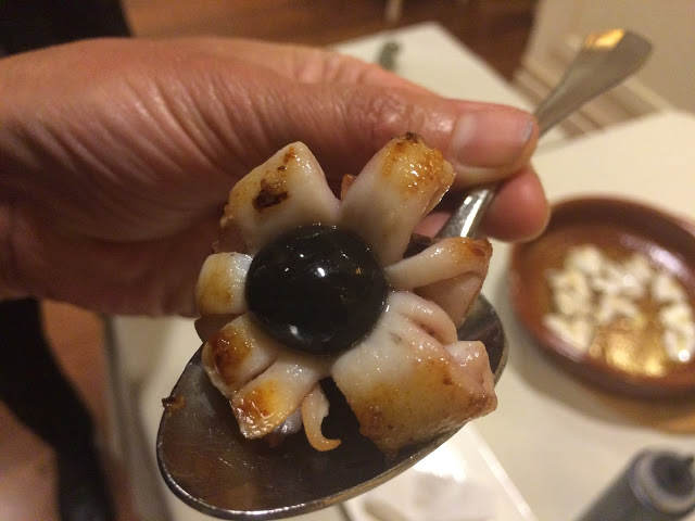 Fried squid with ink wrapped in a milk and seaweed layer, keeping the ink intact until you bite into it - Etxanobe, Bilbao Fried squid with ink wrapped in a milk and seaweed layer, keeping the ink intact until you bite into it - Etxanobe, Bilbao