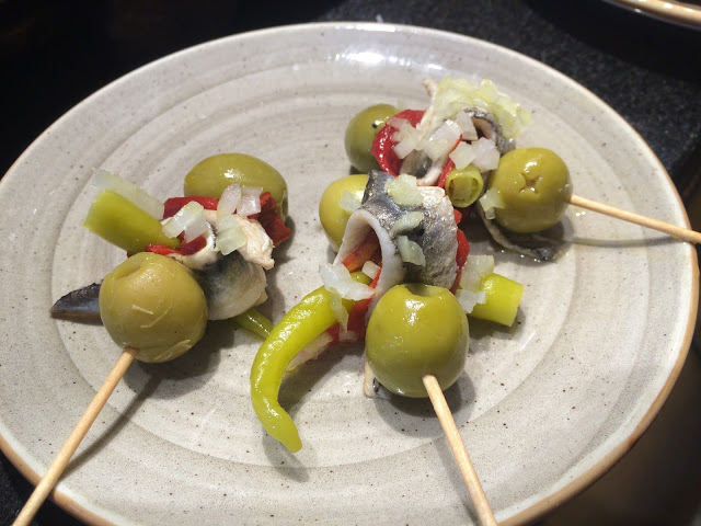 Gilda pintxo - olives, anchovy fillets, spicy peppers and sometimes with onion and olive oil - Basque Country Gilda pintxo - olives, anchovy fillets, spicy peppers and sometimes with onion and olive oil - Basque Country